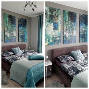 格但斯克Blue - Bastion Wałowa的卧室两张照片,配有两张床