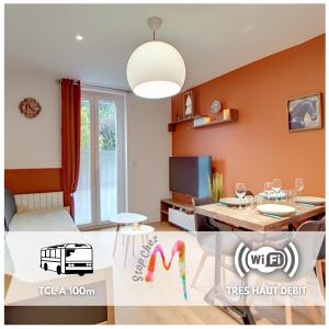 Saint-FonsStop Chez M Select Saga # Qualité # Confort # Simplicité的一间带床的客厅和一间餐厅