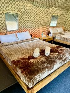 Kodom Bari Retreat, Kaziranga客房内的一张或多张床位