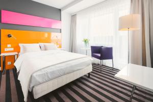 Hola Hotel Katowice客房内的一张或多张床位