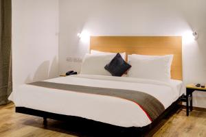 Hotel Qubic Stay Near Delhi Airport客房内的一张或多张床位