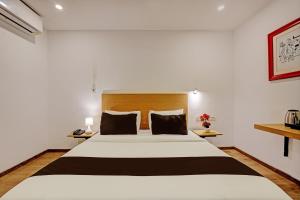 Hotel Qubic Stay Near Delhi Airport客房内的一张或多张床位