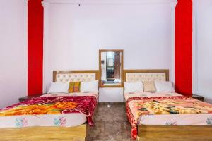 Aravali hills resort客房内的一张或多张床位