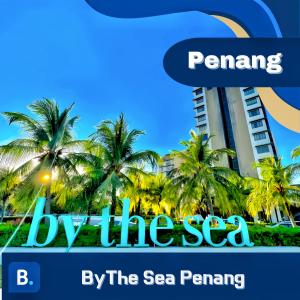 峇都丁宜By The Sea Penang的海边的一座由这些a 半岛建造的建筑