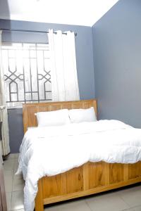 Swahili Homes- Ada Estate客房内的一张或多张床位