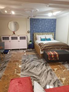Nana Adu Guest House客房内的一张或多张床位