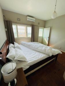 Januario Maputo客房内的一张或多张床位