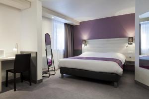 东里尔基里亚德酒店 - 阿斯克新城客房内的一张或多张床位