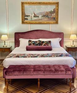 Palazzo Monga Boutique Guesthouse客房内的一张或多张床位