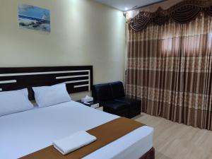 H. V Hotel Bandara Gorontalo客房内的一张或多张床位