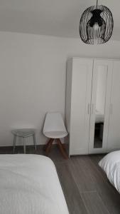 Apartamento moderno a 1km de Granada客房内的一张或多张床位