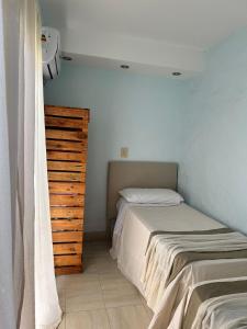 Ahicito - Casa en Tres Cerritos客房内的一张或多张床位