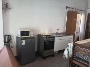 Casa acogedora y funcional的厨房或小厨房