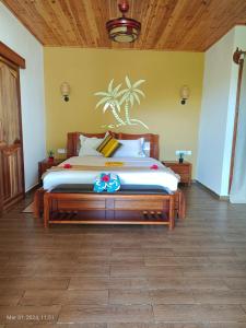 拉迪格岛La Digue Luxury Beach & Spa的一间卧室,卧室内配有一张大床