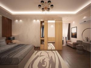 亚历山大مراحب للاسكان الفندقي - منتجع سيسيليا / Maraheb Group For Hotel Accommodation - Cecelia Resort的一间卧室设有一张床和一间客厅。
