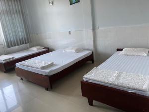 Khách sạn Tường Minh客房内的一张或多张床位