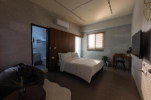 马公木子寓所 Moozhouse的一间酒店客房 - 带一张床和一间浴室