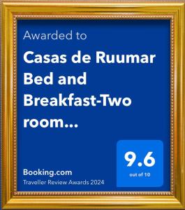 ClarinCasas de Ruumar Bed and Breakfast-Two rooms for family available的一张带框的两室住宿加早餐图片