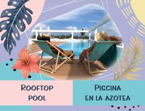 蓬塔卡纳DUKASSI SUITES Hotel ROOMS BEACH Bavaro WIFI Parking ROOFTOP POOL & SPA的坐在游泳池旁椅子上的男人