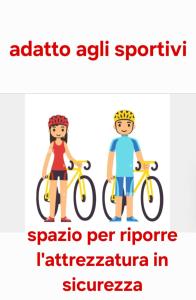 圣洛伦佐因巴纳莱Alloggio la Falesia的两人骑着自行车,每辆汽车上写着"adida advuana sparta"字样