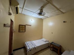 Addis Guest House Djibouti客房内的一张或多张床位