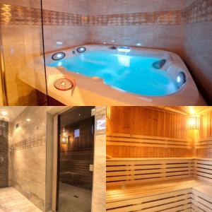 皮耶什佳尼GRAND HOTEL SERGIJO RESIDENCE superior Adult only luxury boutique hotel的带浴缸的客房。