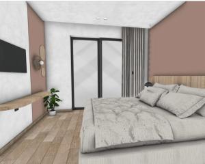 阿凯松Roula Kotsonis Superior Apartment的一间带大床和电视的卧室