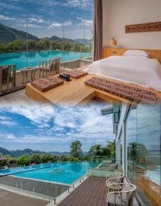 张家界Avatar Mountain Resort的享有游泳池景致的卧室