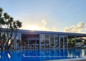 阿尔米罗斯海滩Villa Pami的别墅 - 带游泳池,可免费进入绘画区