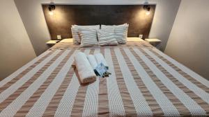Essencial Hotel & Spa客房内的一张或多张床位