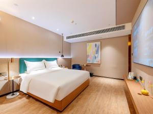 宜致X酒店(北京路步行街团一大广场地铁站店)客房内的一张或多张床位