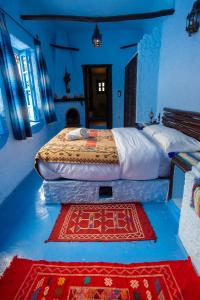 达达迪奇雷夫摩洛哥传统庭院住宅客房内的一张或多张床位