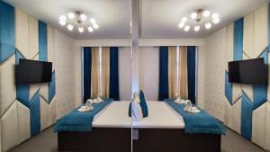 杜尚别Hotel Tajikgrey Dushanbe的一间睡床上有鸭子的房间