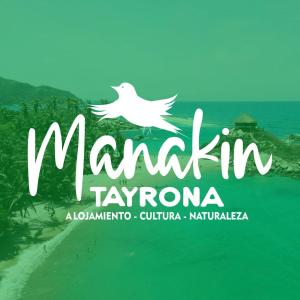 埃尔扎伊诺Hotel Manakin Tayrona的一只白鸟飞过海洋