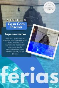 巴拉奈里奥-坎布里乌Casa com piscina em Balneário Camboriú的一张带笔记本电脑的海报,供您品尝 ⁇ 