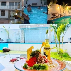 卢林Habitaciones Matrimoniales en Playa Pulpos HOSPEDAJE DELFINES HOUSE的游泳池旁餐桌上的一盘食物