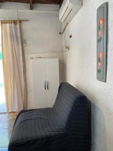Tres Lunas Alojamiento Individual客房内的一张或多张床位