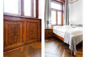 克拉科夫Magnificent Apartments Zyblikiewicza 11a, central location的一间卧室配有一张床和一个木制橱柜