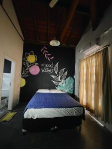 Hostel Caiçara Maresias客房内的一张或多张床位