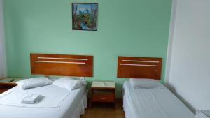 PLAZA HOTEL MARABÁ客房内的一张或多张床位