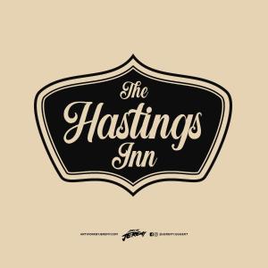 黑斯廷斯Hastings Inn的黑白的标志,读出黑皮肤