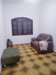 Casa a meia quadra da Praia do Caiçara PG客房内的一张或多张床位