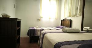 Casa Bugambilias客房内的一张或多张床位