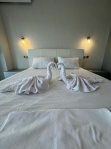 Aqua Mare Luxury Apartments客房内的一张或多张床位