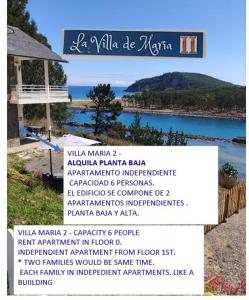 比利亚维西奥萨LA VILLA DE MARIA -CASA MONICA Y GEORGE PLAYA DEL PUNTAL Planta Baja CASA ADOSADA en Villaviciosa ASTURIAS的湖畔餐厅标志