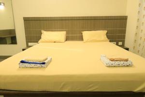 Transit Nest - Homely stay Near Madurai Airport客房内的一张或多张床位