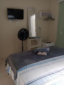 HoStel de Setiba - HOSPEDARIA OCA RUCA客房内的一张或多张床位