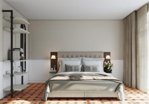 迈伦西斯岑安西酒店的卧室配有一张带白色墙壁的大床