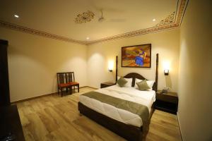 Hotel Sahibs Royal Ville - Elegance by the Taj客房内的一张或多张床位