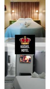 巴耶杜帕尔Hotel Kasvel的酒店客房配有一张特大号床和一台电视。